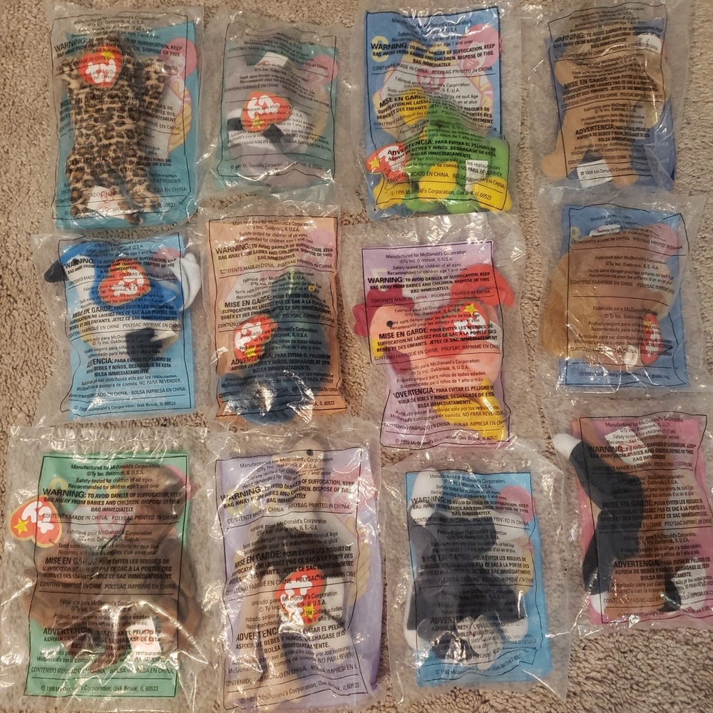 RARE full set of Ty beanie babies still in the package! Perfect condition.